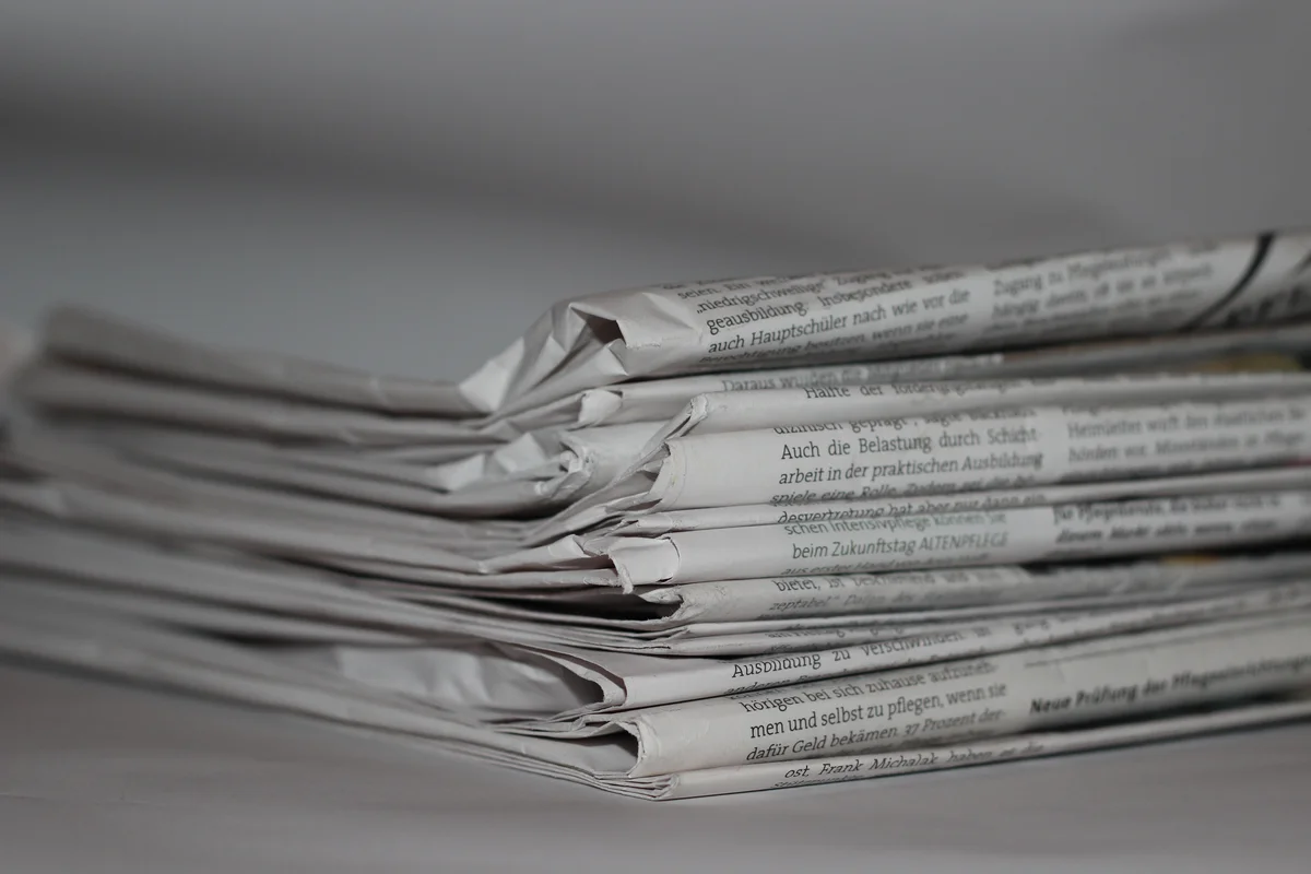 Folded newspapers